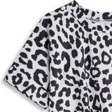 <img src="White-Black-Prints-Short-Sleeve-Tie-Front-Tunic-Rockin-Wonder.jpg" alt="White Black Prints Short Sleeve Tie Front Tunic Rockin Wonder" loading="lazy">